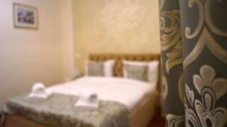 Отель Pensiunea Romeo Resort Фокшани Улучшенный номер с кроватью размера «king-size»-9