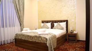 Отель Pensiunea Romeo Resort Фокшани Улучшенный номер с кроватью размера «king-size»-10