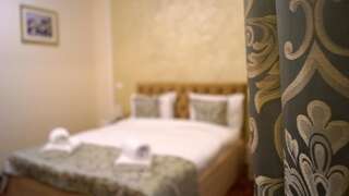 Отель Pensiunea Romeo Resort Фокшани Улучшенный номер с кроватью размера «king-size»-14
